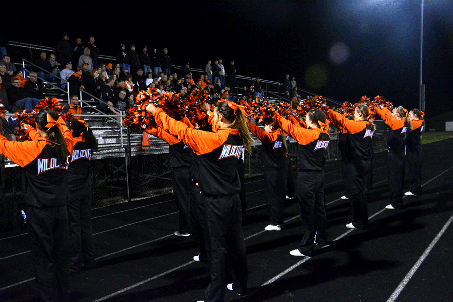 The varsity cheerleaders perform the fight song after an LHS touchdown at Zion-Benton.