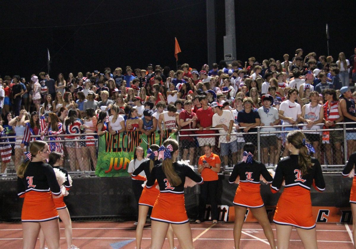 During the second quarter, the cheer team entertains the student section by chanting Libertyville’s school song. At this time the score was 20-7 Wildcats v. Lake Zurich.