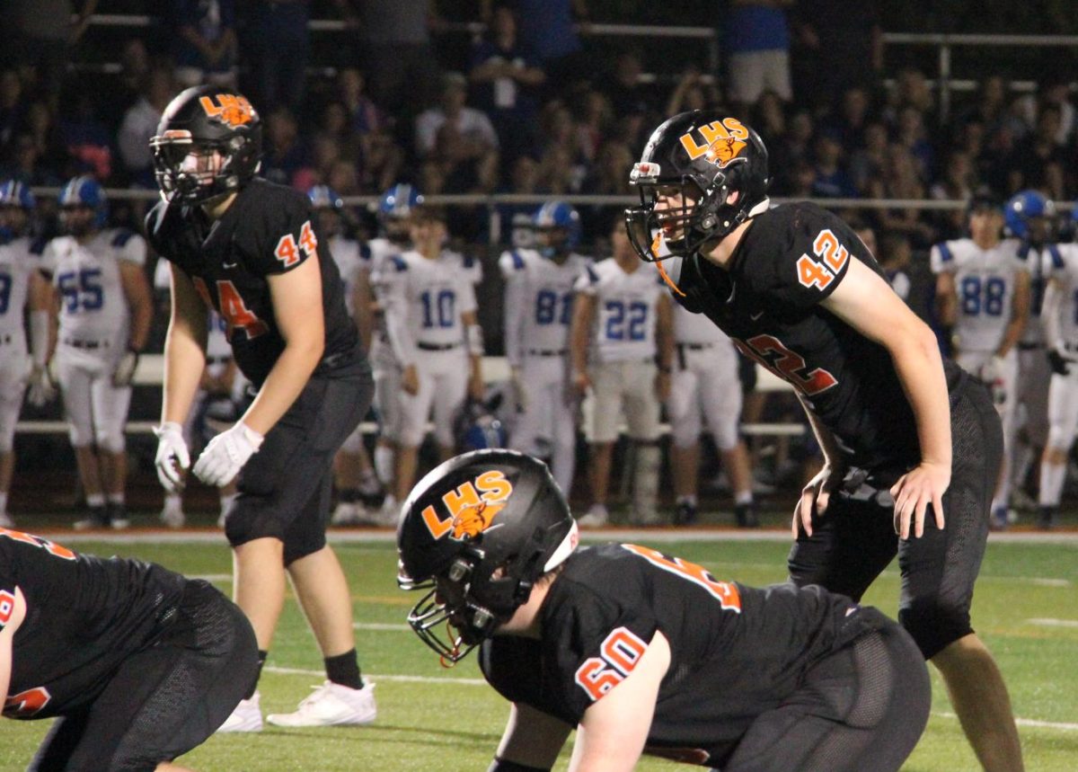 Senior Harrison Clarkson (42) focuses before the hike at the start of the third quarter.