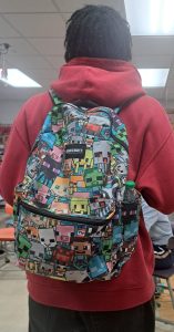 Senior Javonta Booker shows off his senior backpack. 