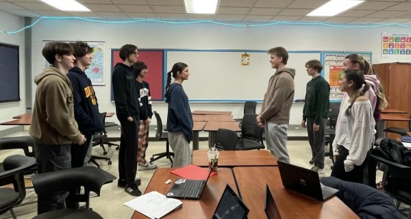 German IV honors students participate in a whole class staring contest. This is an icebreaker that German teacher Ms. Lechner enjoys doing with her German one students at the beginning of the school year to break the ice and get the students more comfortable with each other before beginning to learn and speak German. 