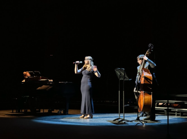 Junior Zoe Muller and Luc Domingo-Snyder perform “Let’s Call the Whole Thing Off” by George Gershwin, accompanied by junior Thomas Texiera on the upright bass. Every year, this concert gives the students a chance to be featured throughout the night. “Here at LHS, I really like how many opportunities the students get,” said junior Marley Herchenbach. 